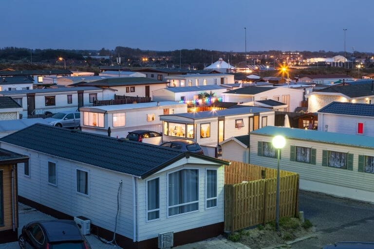 mobile home park with multiple mobile homes sitting closely together forming a housing community